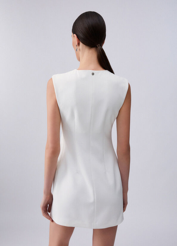 Abito corto con borchie
