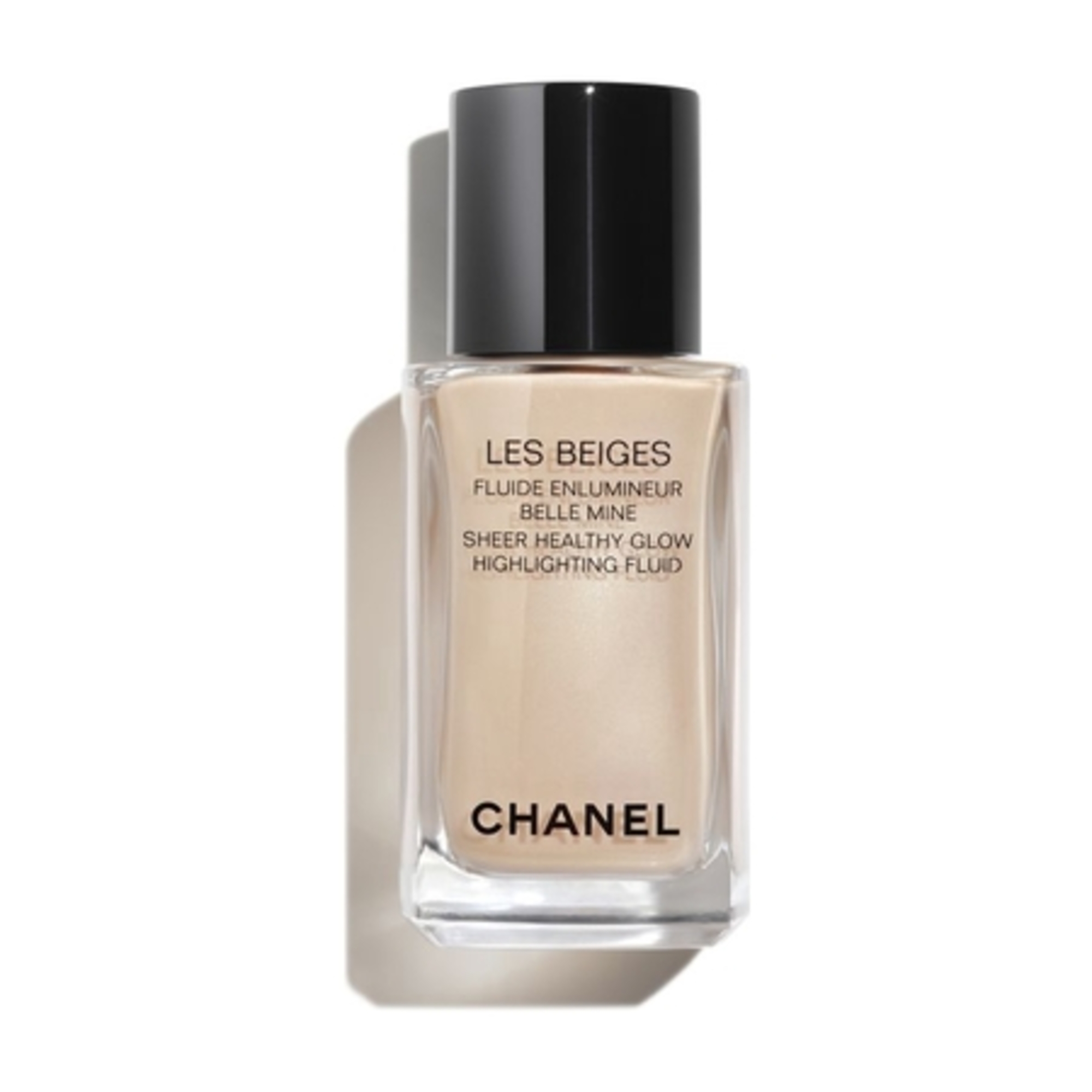 MAQUILLAGE SOLAIRECHANEL LES BEIGES FLUIDE ENLUMINEUR ENLUMINEUR DE TEINT EFFET IRISÉ. BELLE MINE LUMINEUSE VISAGE ET CORPS