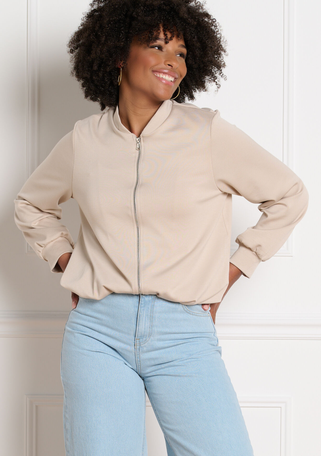 Soepele jas met rits