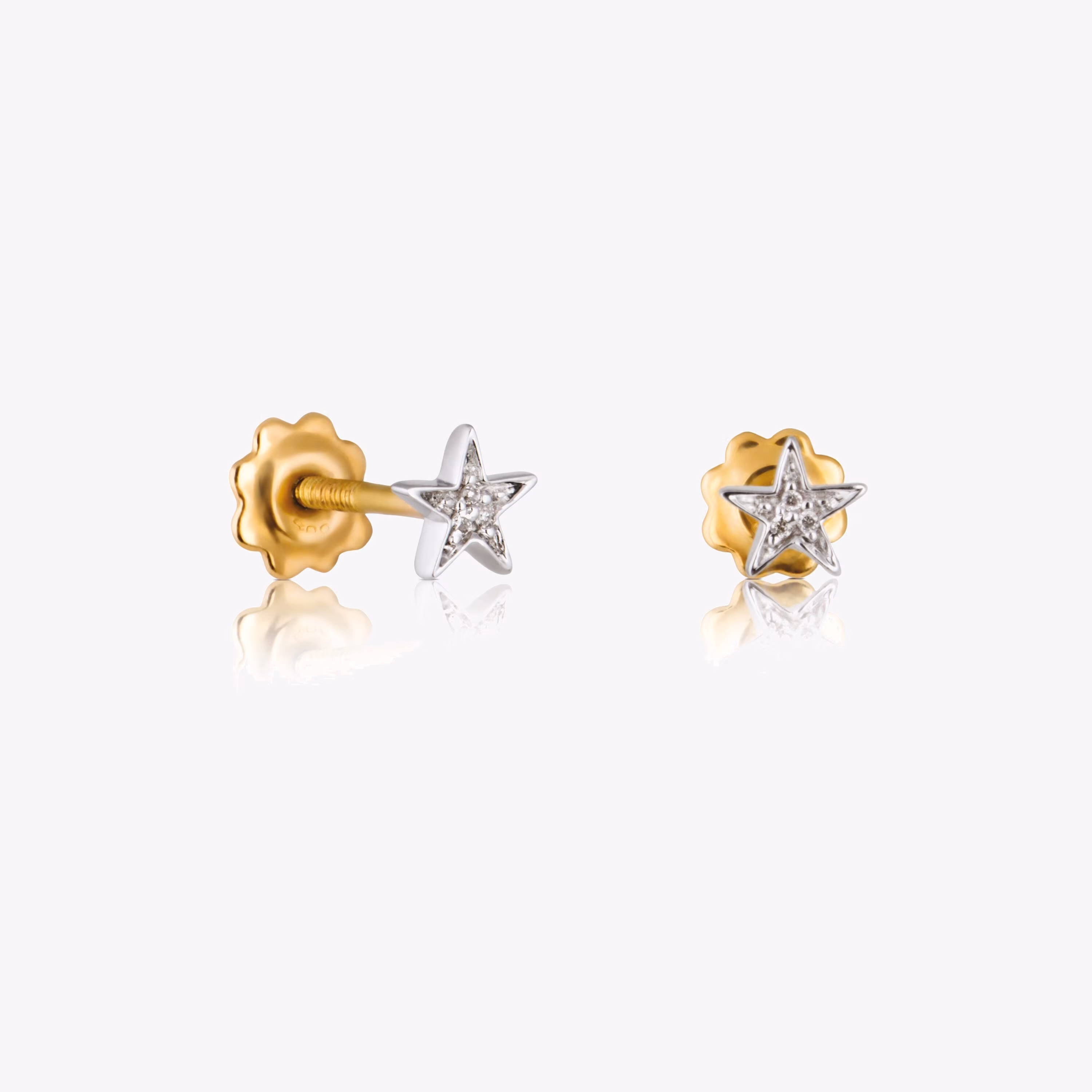 Pendientes estrella de oro blanco y diamantes Puppies