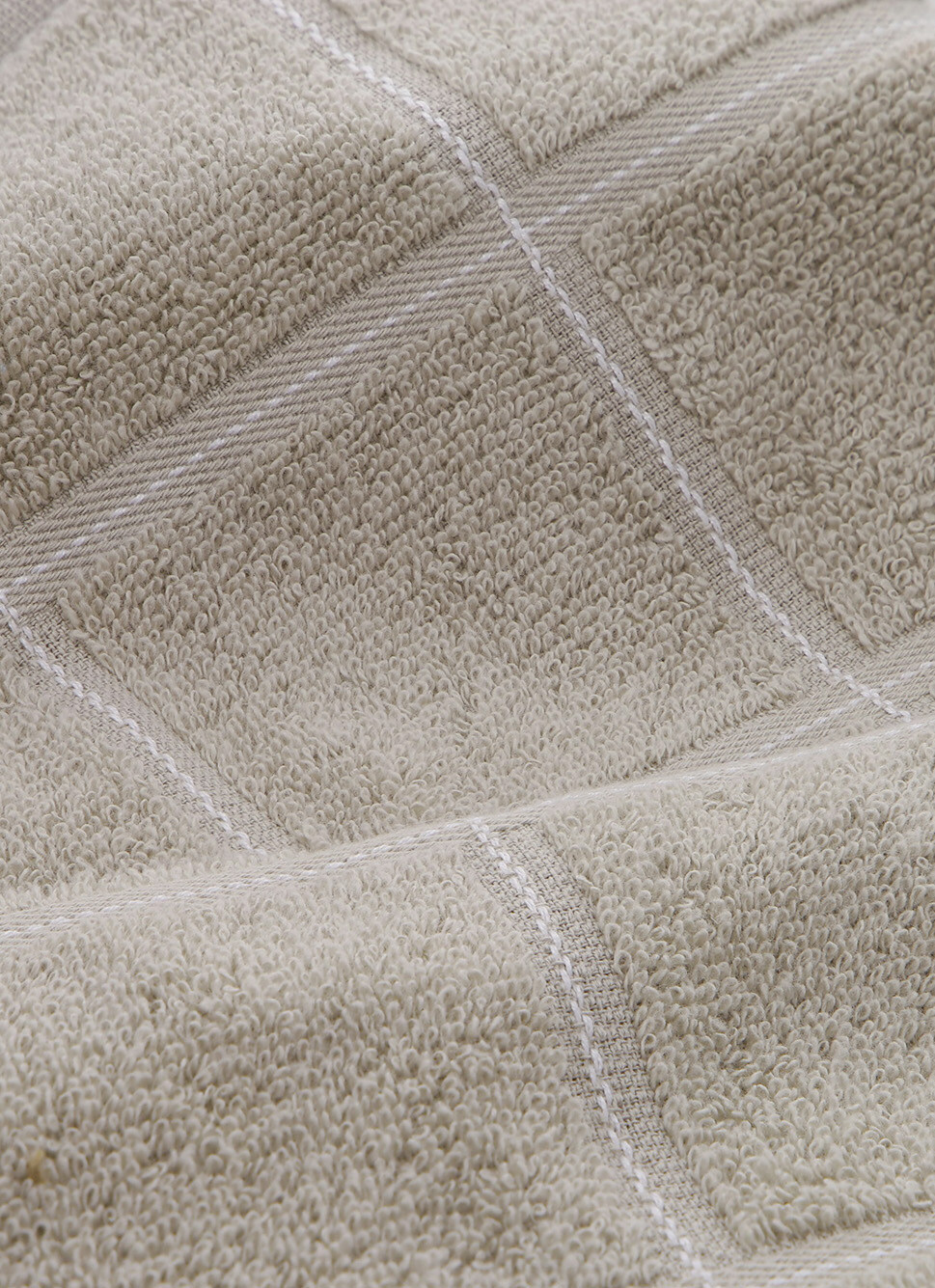 ESSUIE-MAINS EN ÉPONGE à CARREAUX BEIGE