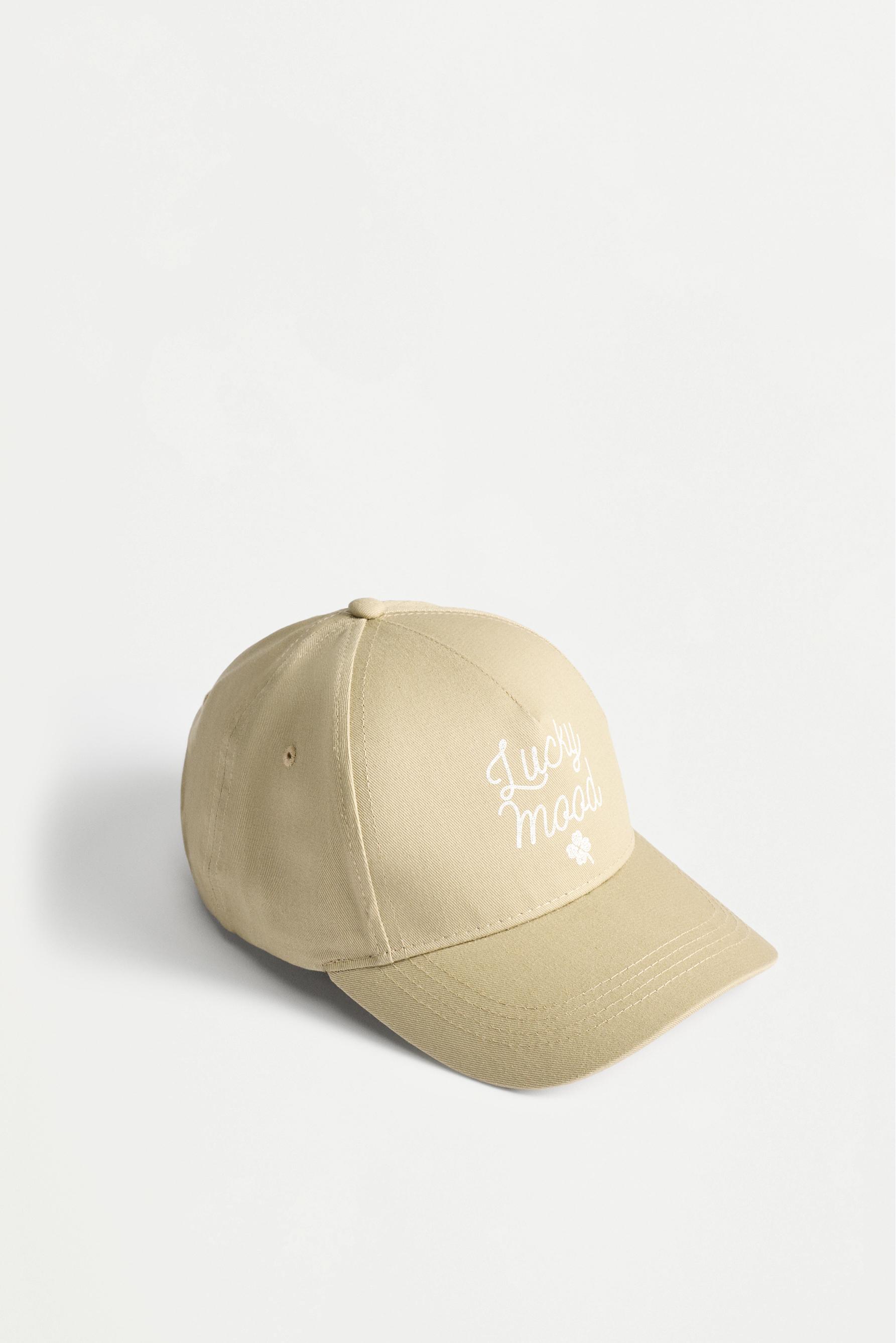 Gorra texto y flor