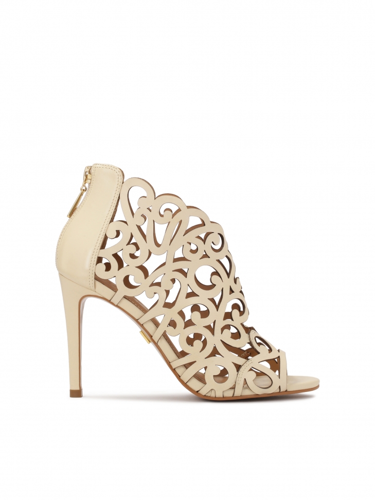 Cream peep toe boots with openwork pattern
