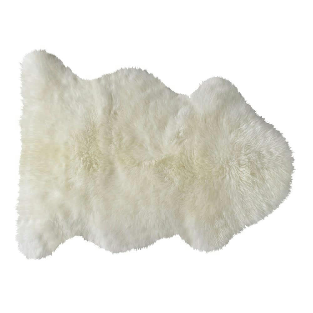 - Tapis shaggy en peau de mouton ivoire 55 x 90 cm