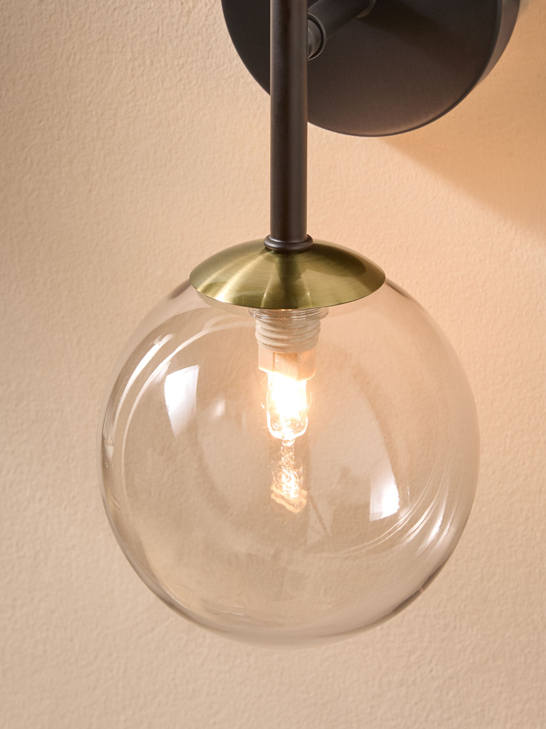 Globe Wall Light in Black Antique Brass