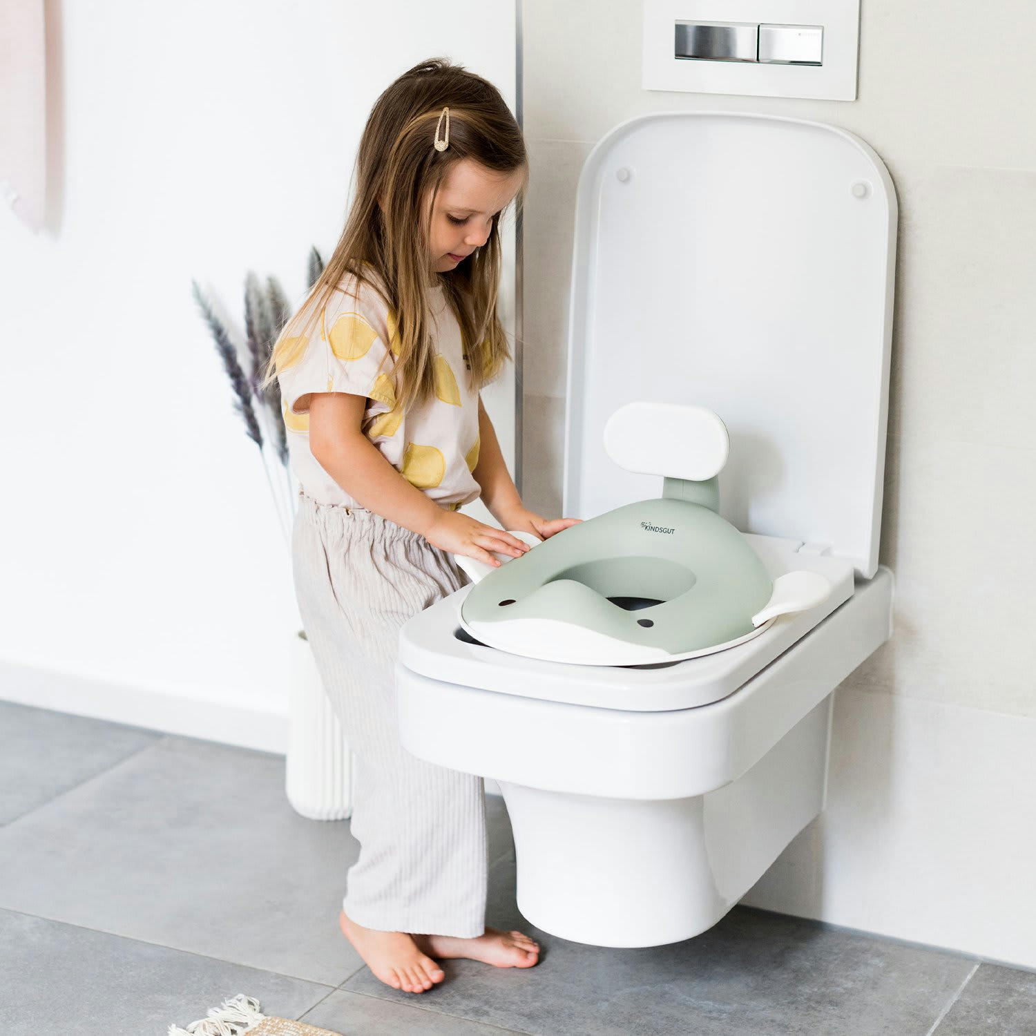 - Réducteur de toilette baleine