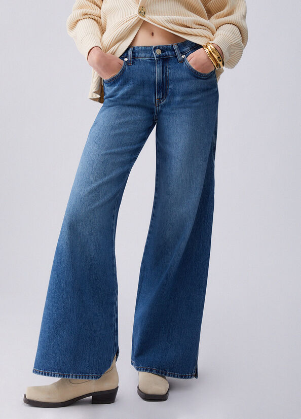 Jeans flare con spacchetti laterali