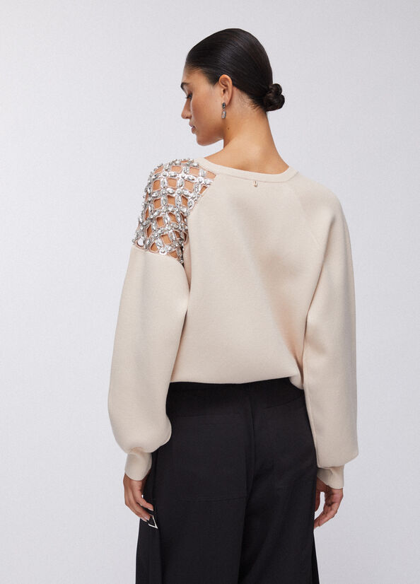 Maglia con ricamo gioiello