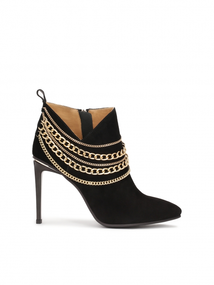 Striking stiletto boots with cut-out upper