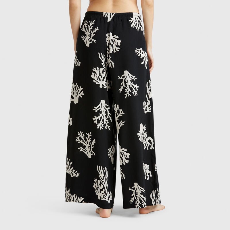 Trousers with coral print