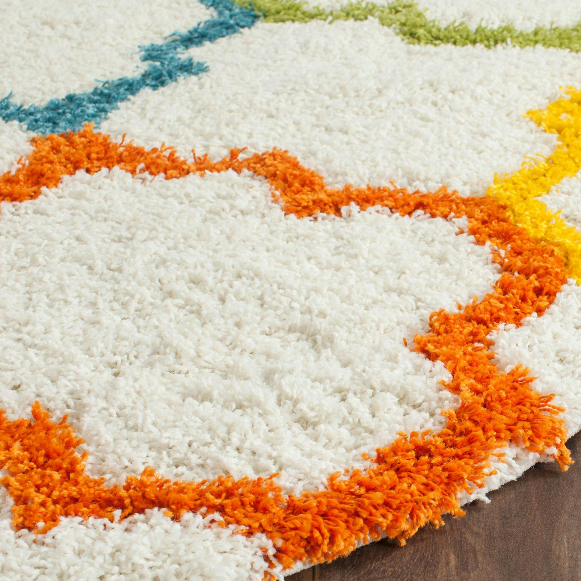 Safavieh Kids Round Shag 569 Rug, Ivory/Multi, 6-ft 7-in x 6-ft 7-in