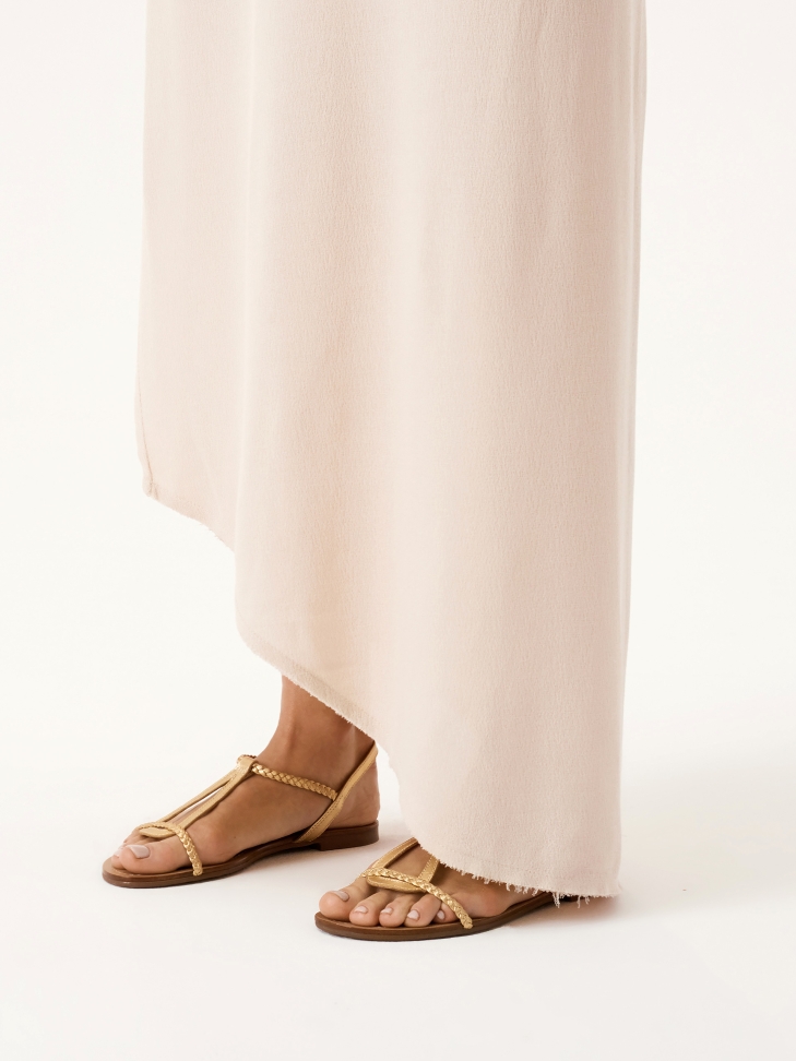 Gold sandals on a flat sole