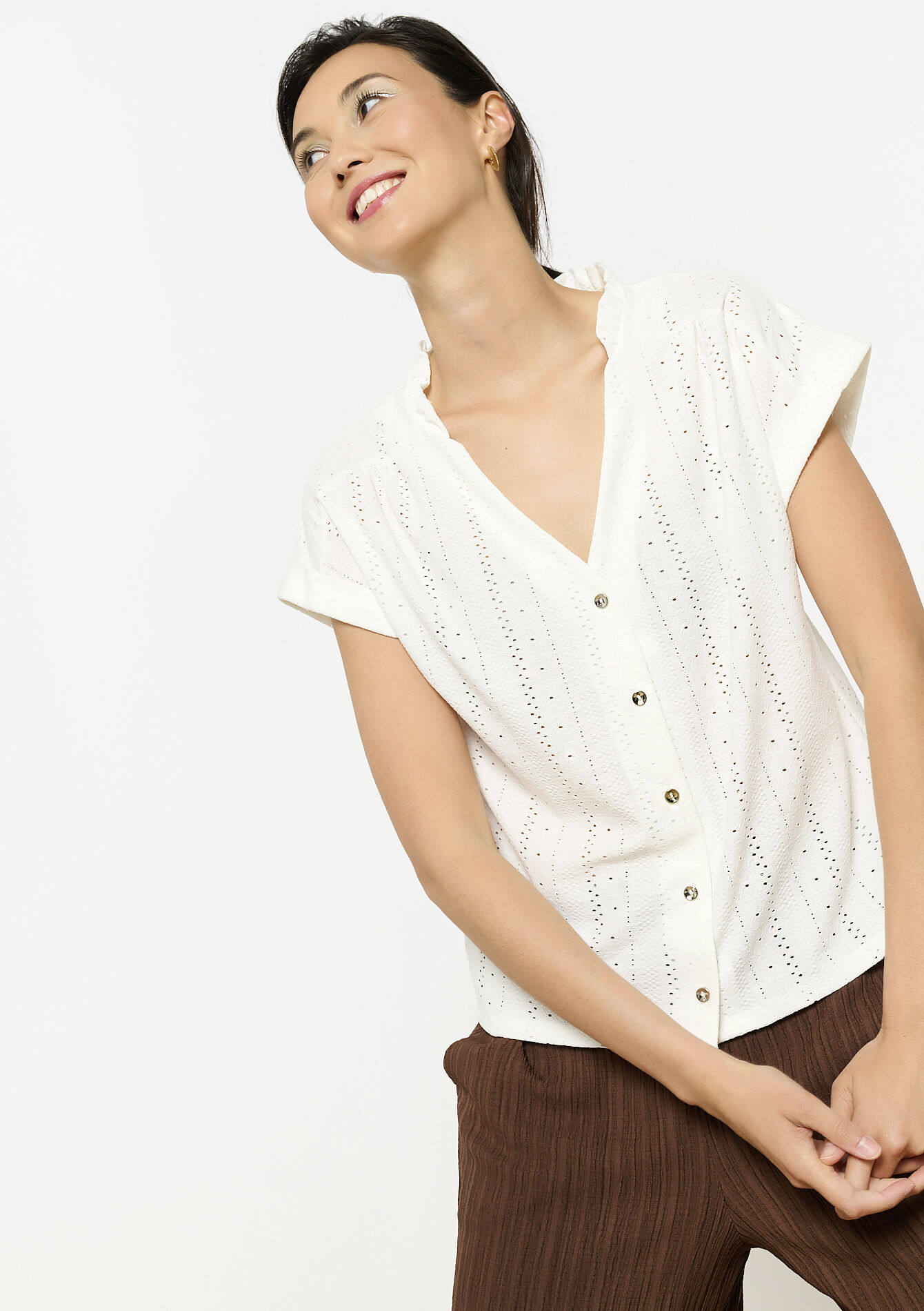 Opengewerkte top met knopen