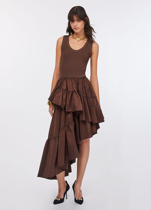 Abito asimmetrico con volant