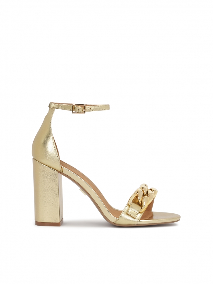 Golden block heel sandals with a covered heel