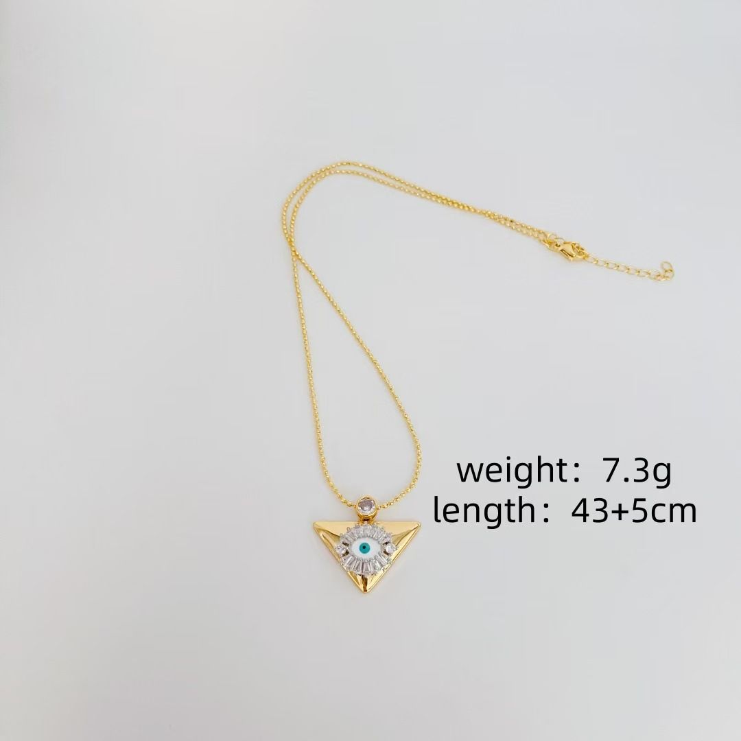 PEACH ACCESSORIES Evil Eye Triangle Pendant Necklace in Gold