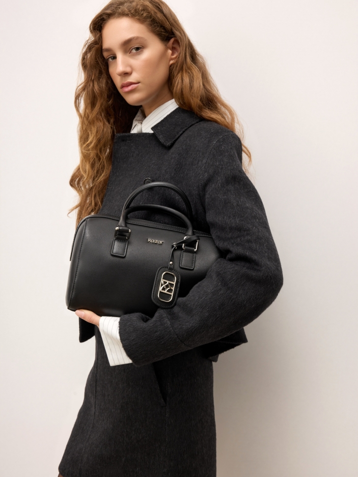 Cylindrical black leather handbag