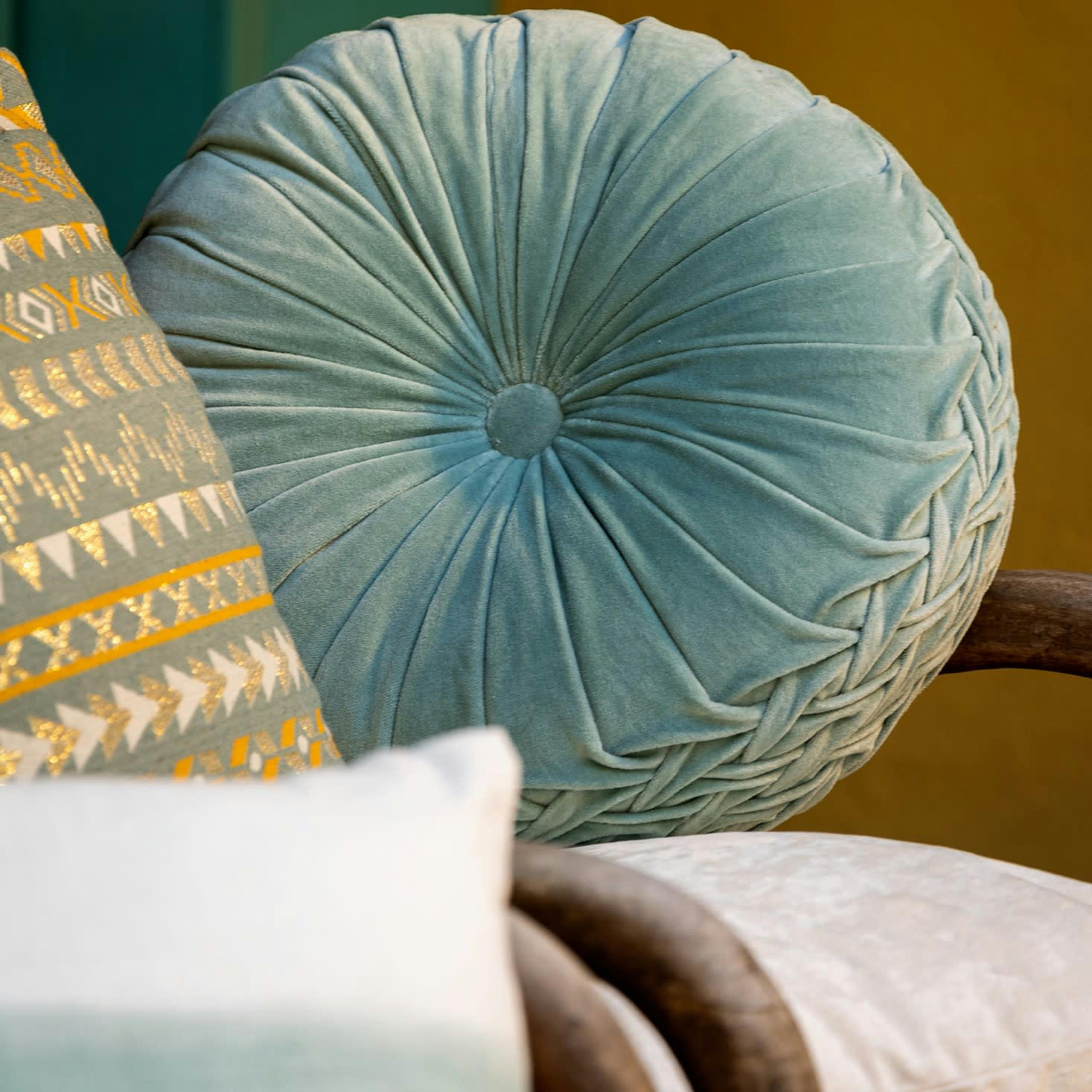 KAJA - Coussin rond vert en velours 40 cm uni