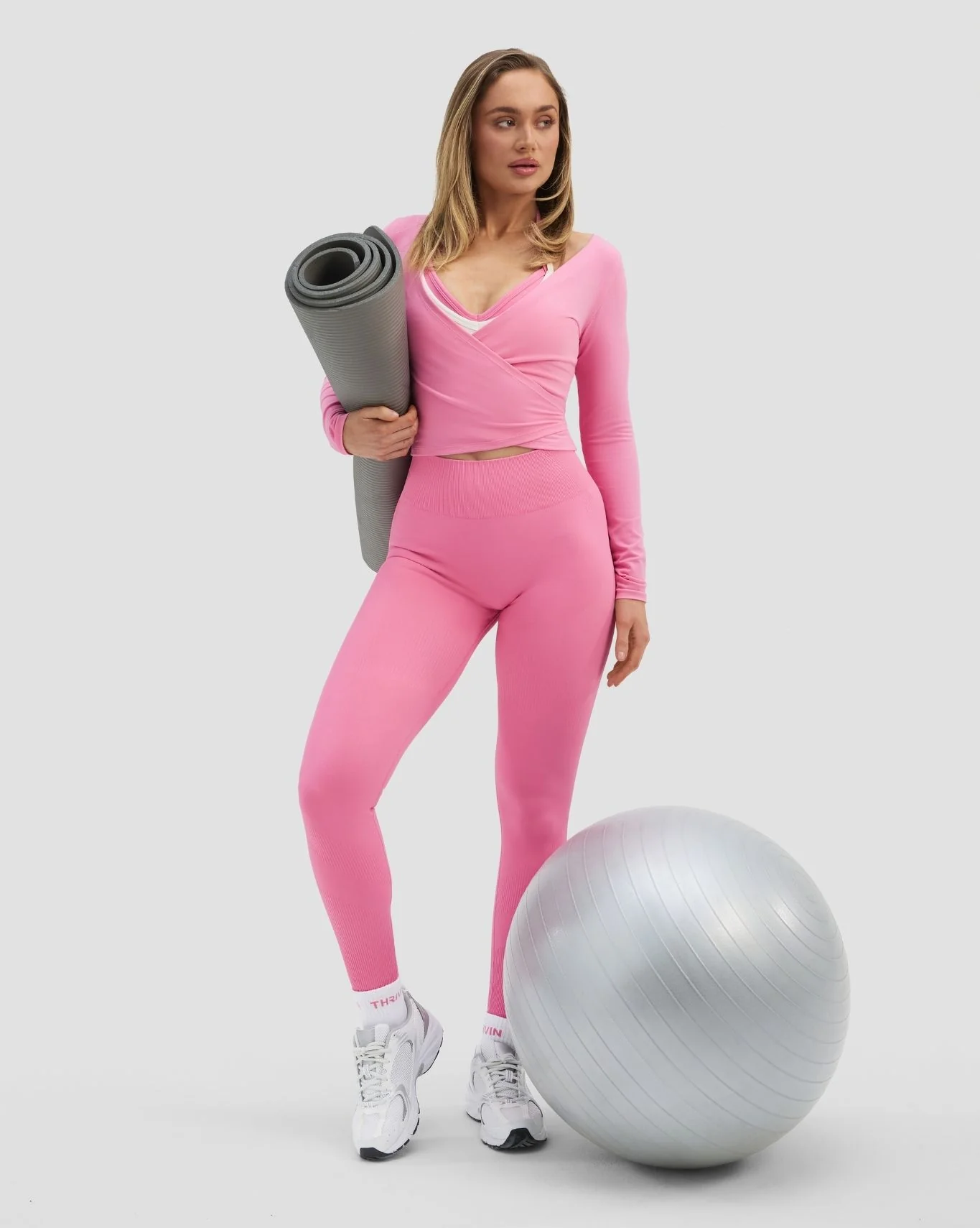 Elevate™ Sculpting Seamless Adjustable Halter Bra | Bubble Pink