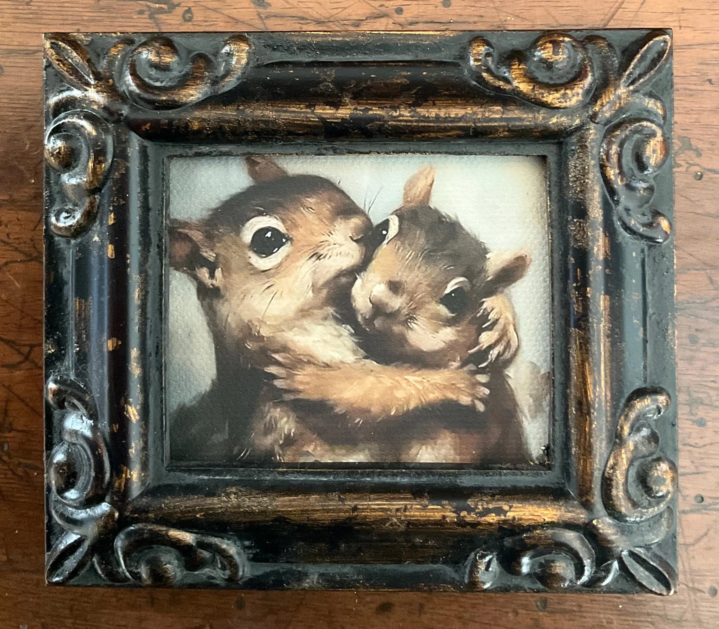 HAND PAINTED MINIATURE of loving squirrels on a 2.5”x3” linen paper print , bonded to canvas & placed in an Antiqued Resin Frame