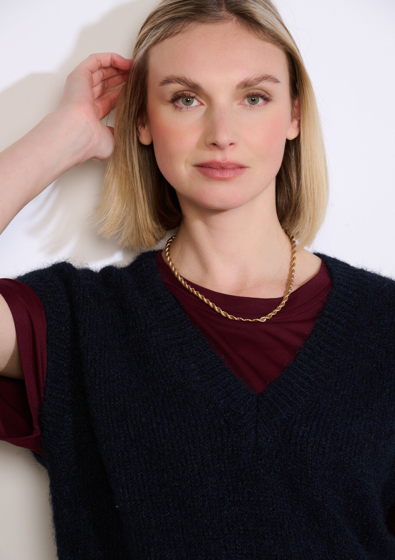 Mouwloze V-hals trui