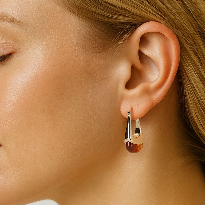 Manfield Goudkleurige oorbellen met bruine details