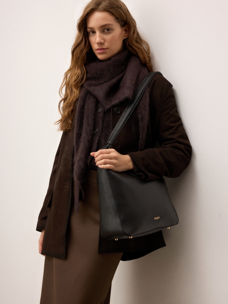 Black leather handbag with adjustable strap