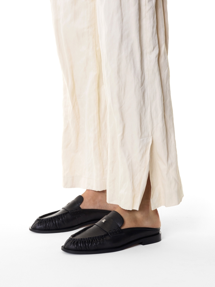 Black loafers style mules