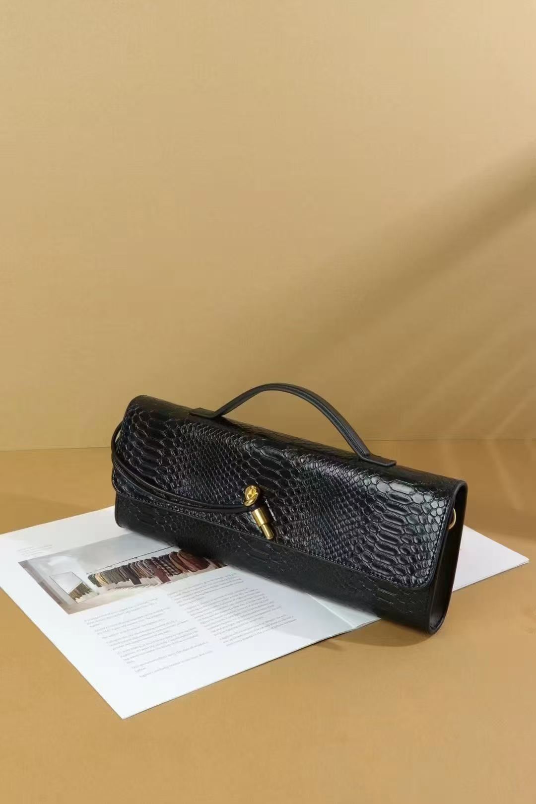 PEACH ACCESSORIES Woven Clutch Bag with Gold Hardware Snake Print