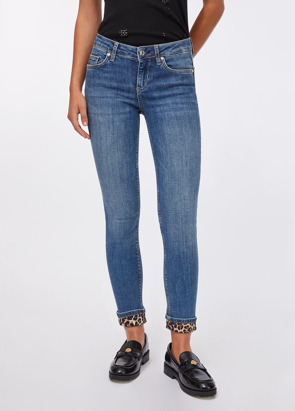 Jeans skinny con risvolto