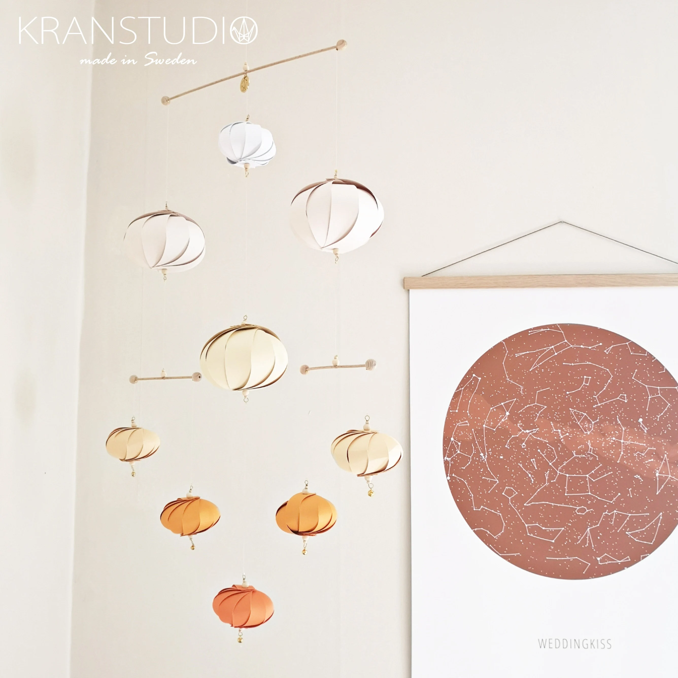 Kinetic mobile for adults, orange tones, sunset gradient, 9 origami ellipses