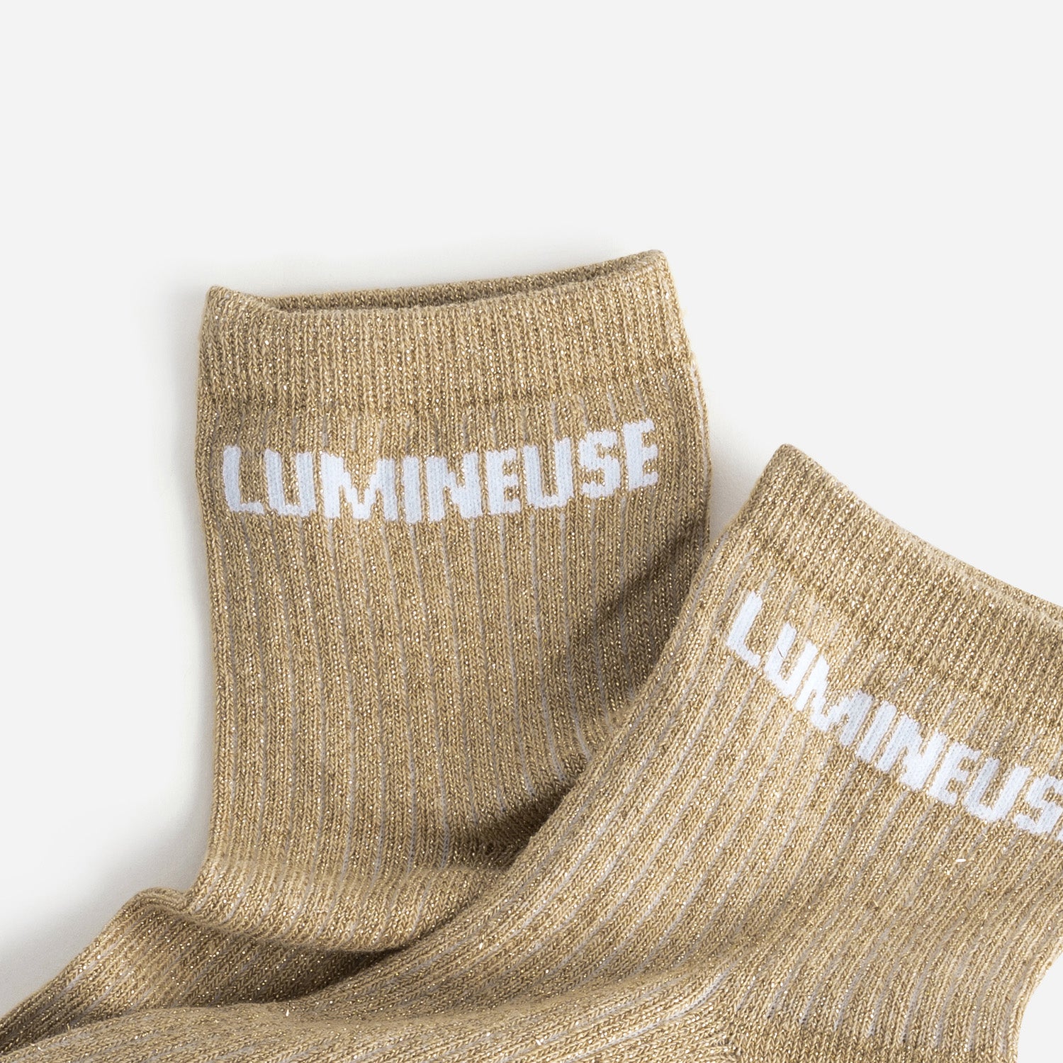 Chaussettes beiges pailletées à message