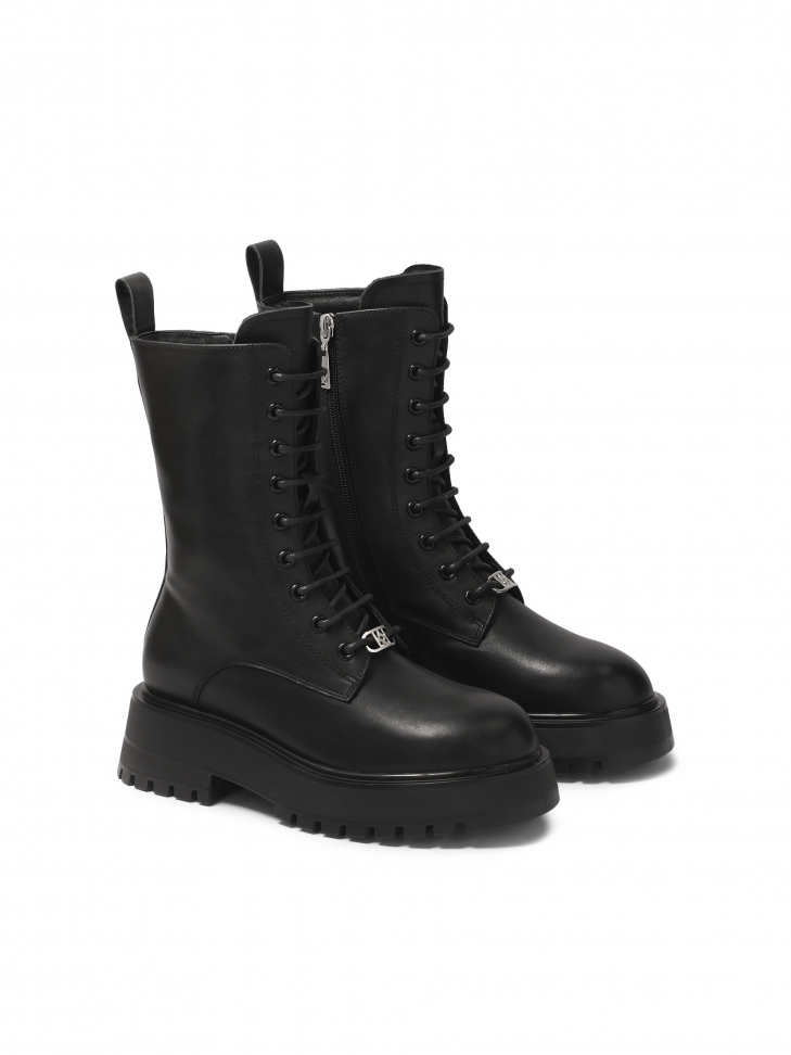 Black boots with high upper in military style