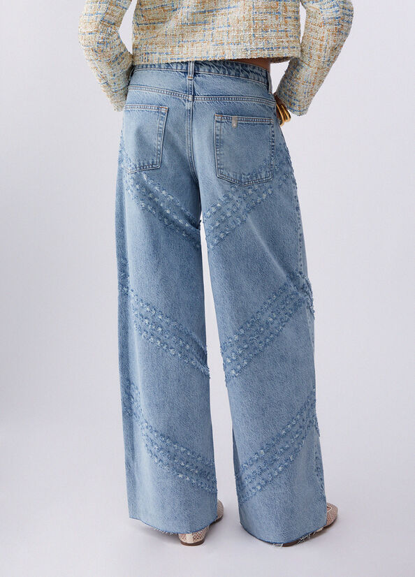 Jeans flare con dettagli laserati