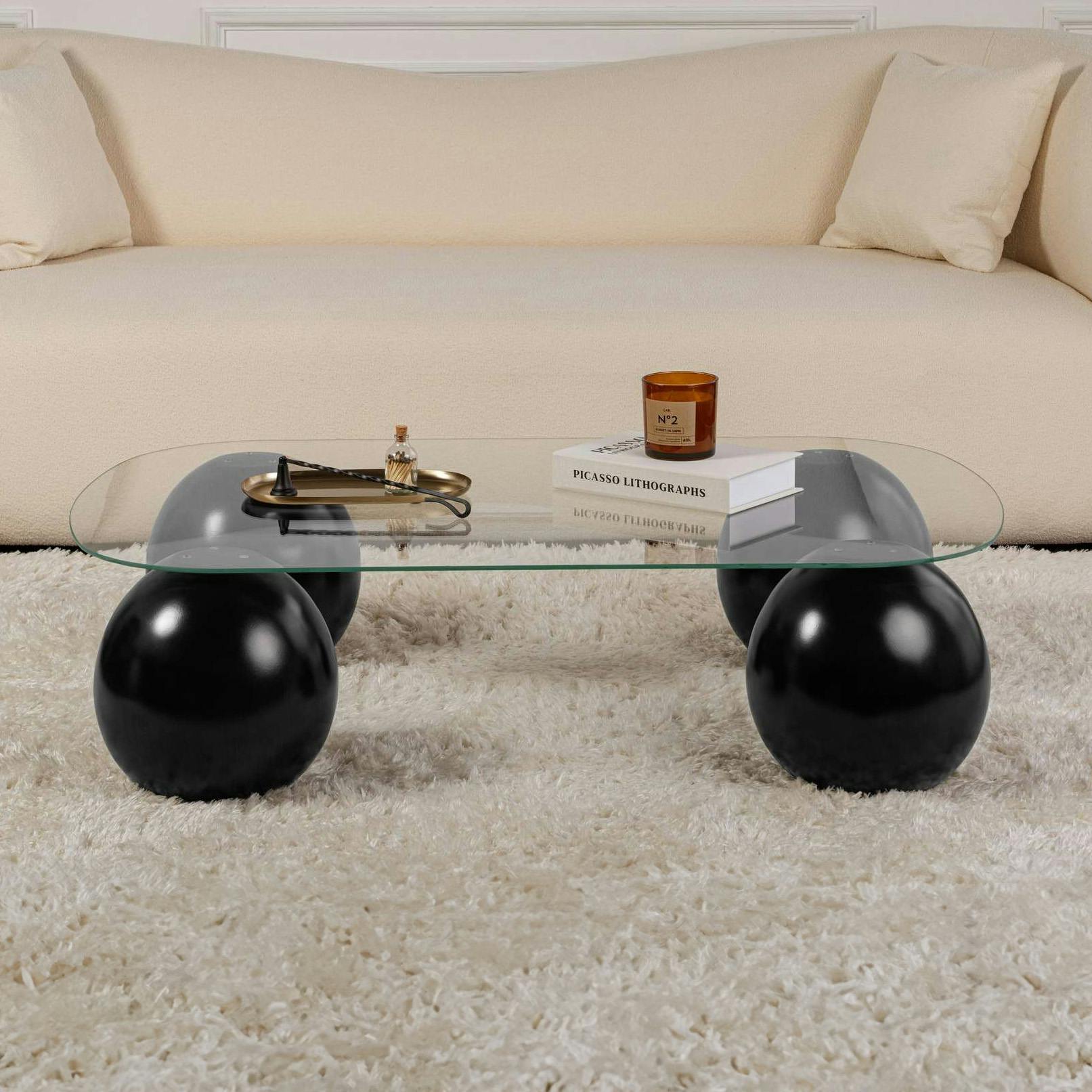 Table basse verre bords arrondis - 4 pieds boules noirs KOCHI