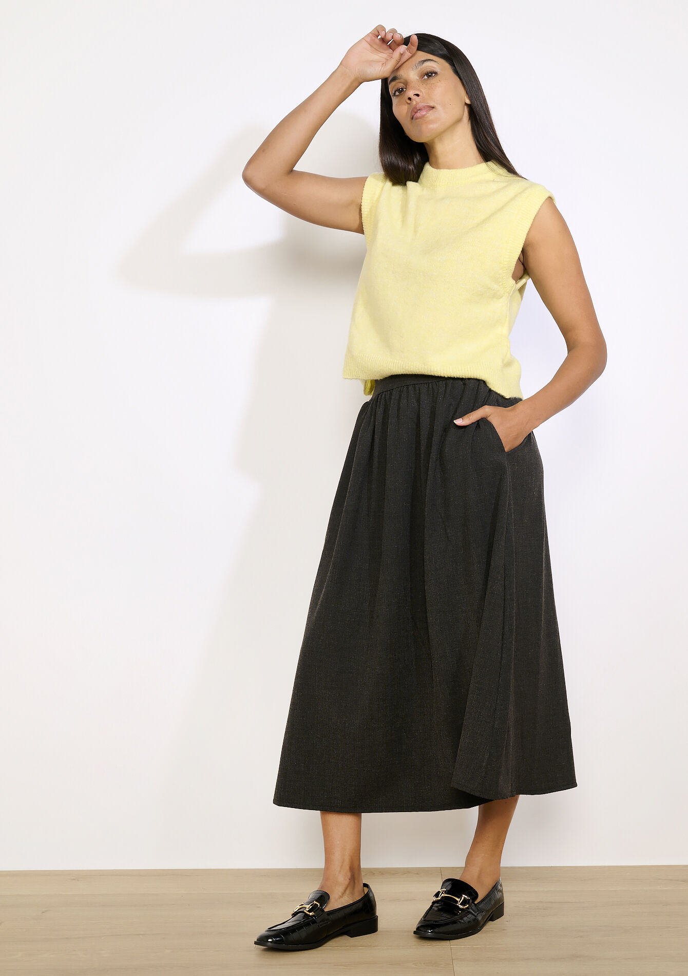 Mouwloze gebreide trui