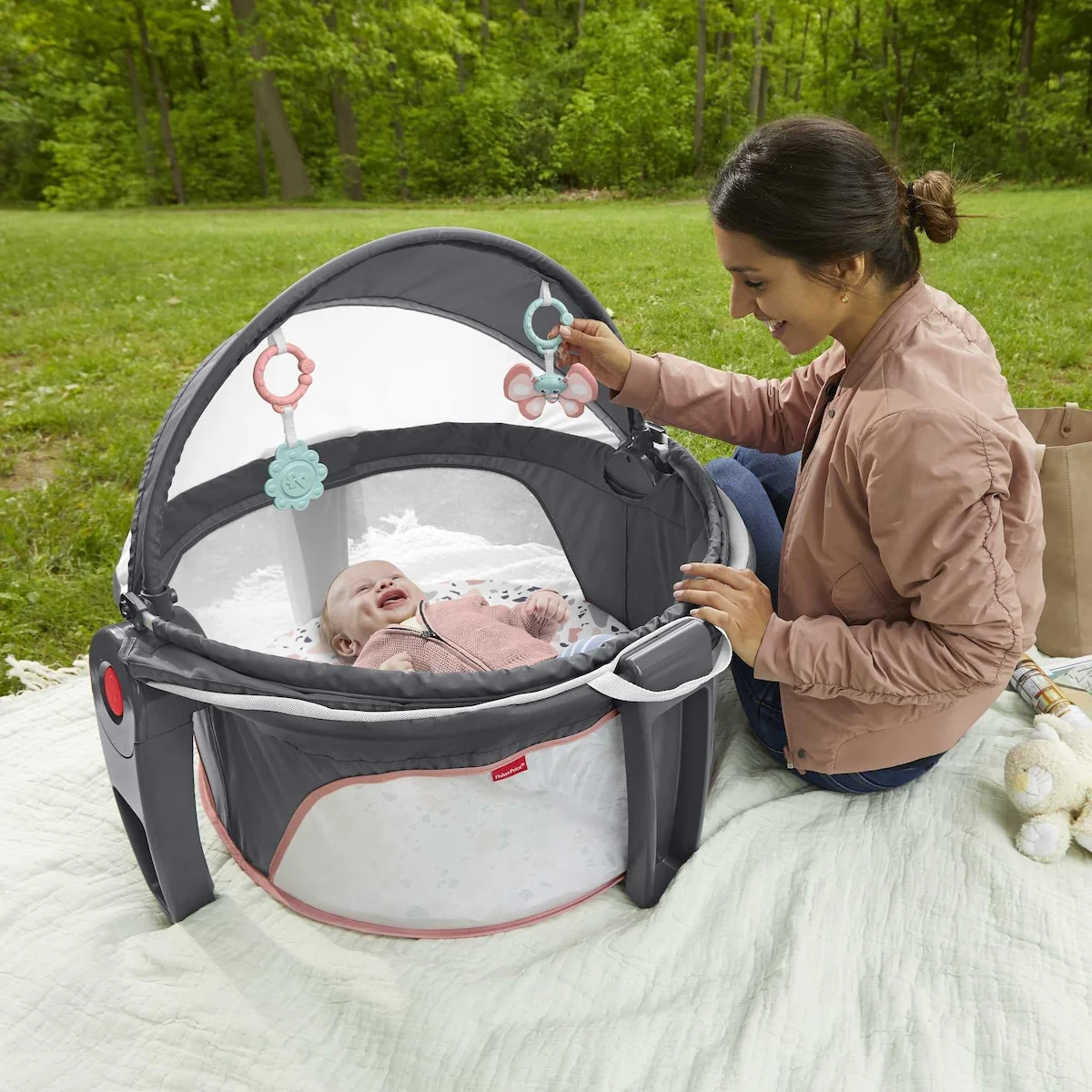 Portable Bassinet and Play Space On-the-Go Baby Dome with Developmental Toys and Canopy, Pink Pacific Pebble
