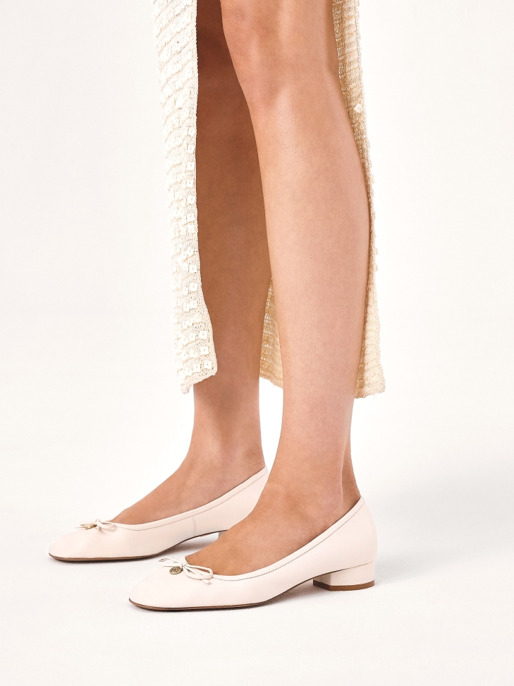 White leather low-heeled pumps