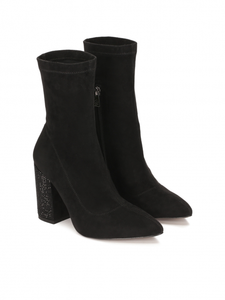 Black boots with rhinestone-embellished heel