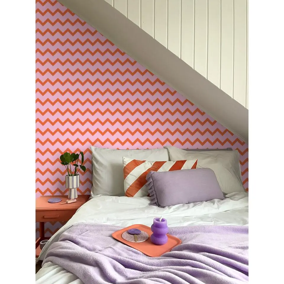 ESTAhome behang zigzag motief oranje en roze - 50 x 900 cm
