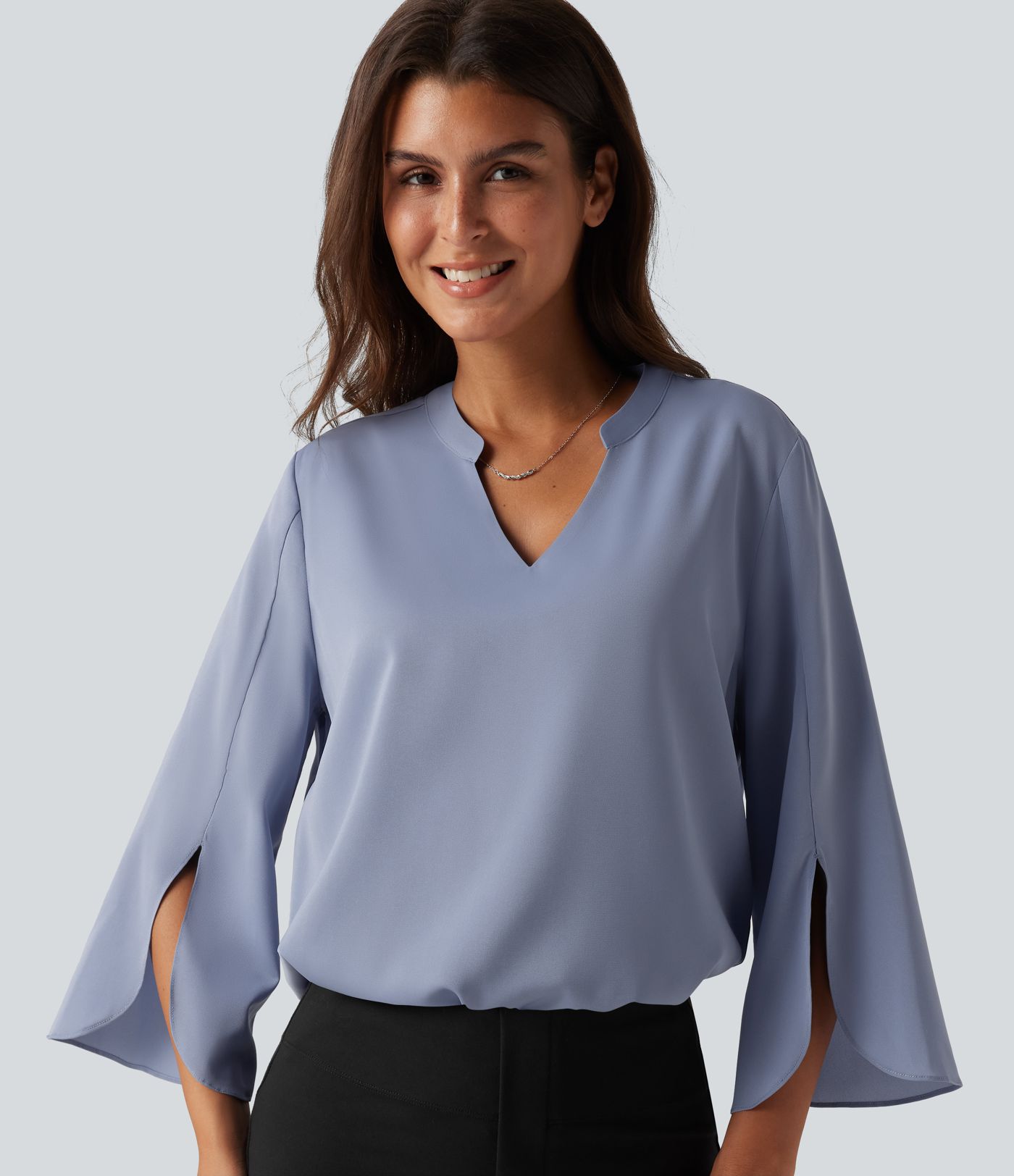 Blouse de bureau à col V, manches longues à volants et ourlet arrondi