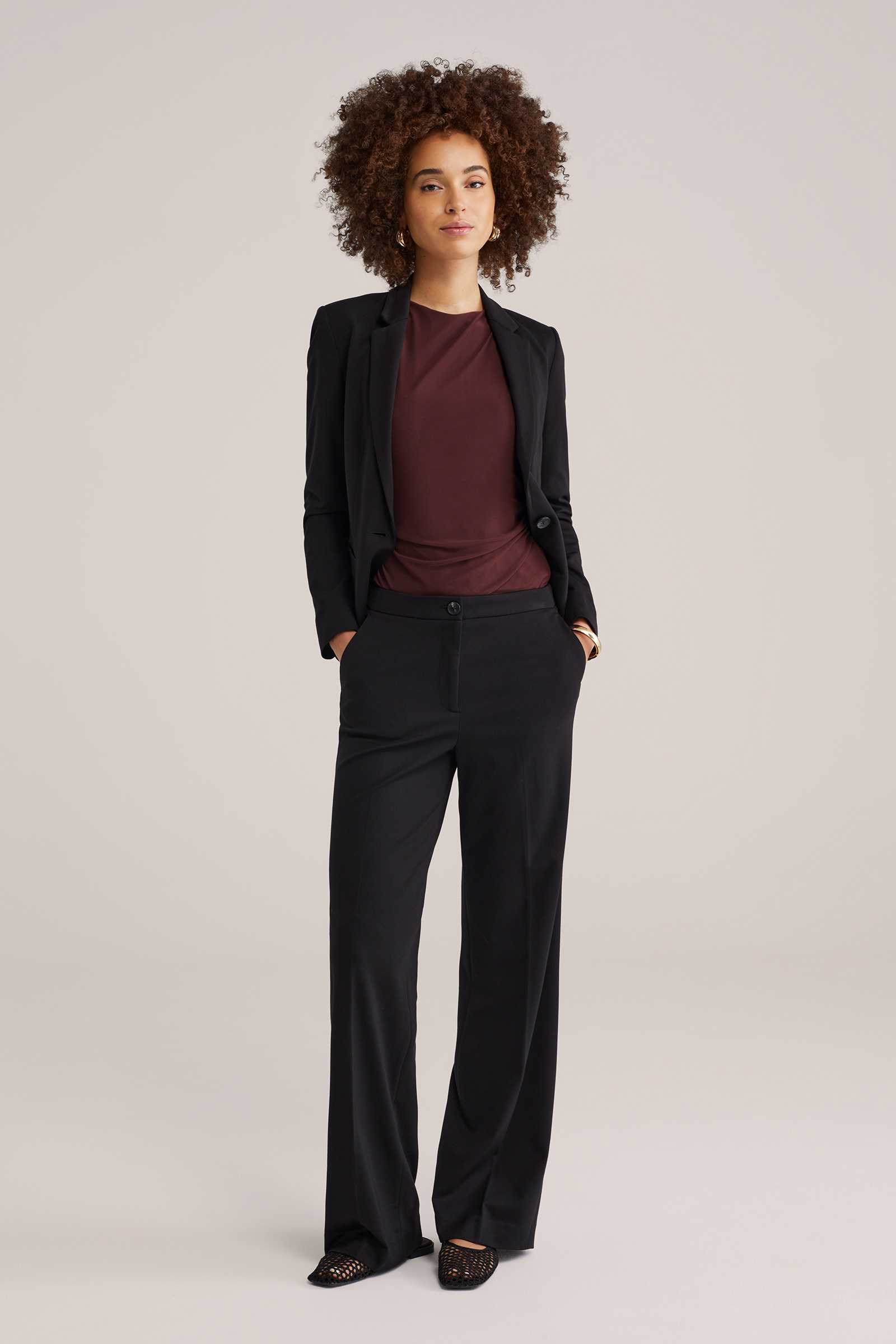 Dames jersey top met gedrapeerd effect