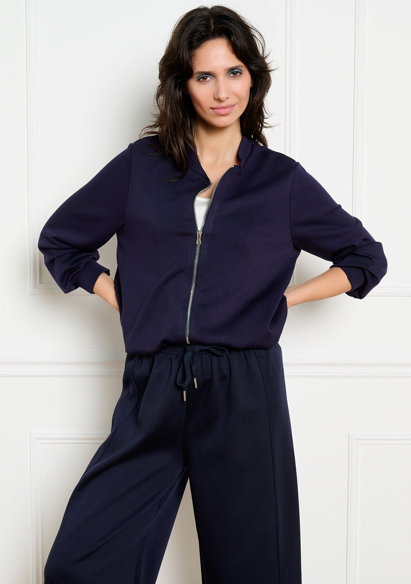 Soepele jas met rits