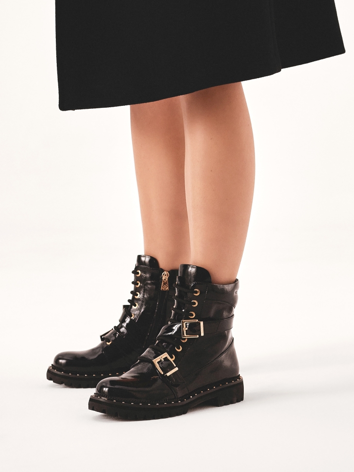 Patent leather boots with zippers and laces