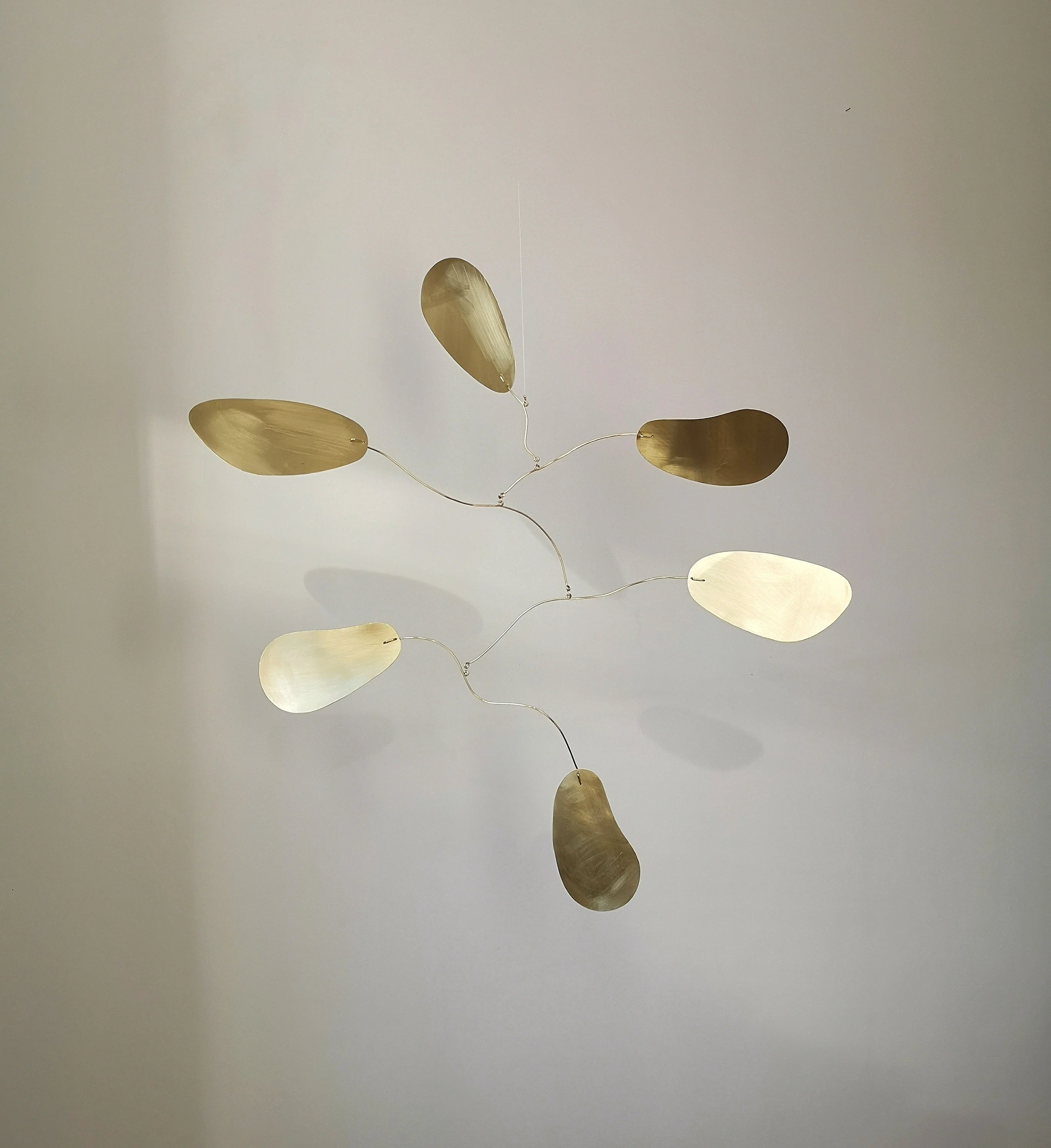 Brass kinetic mobile. Mid-century modern hanging sculpture. Gold metal wall art