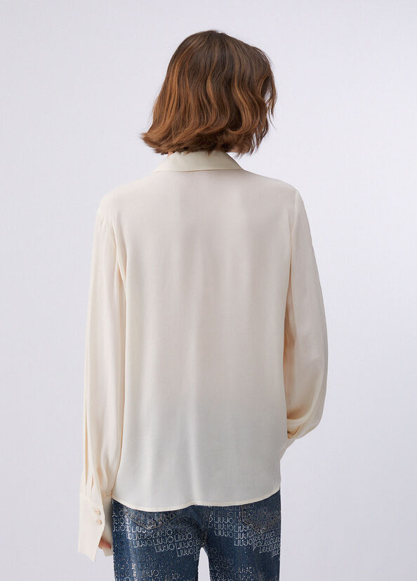 Camicia con bottoni logati