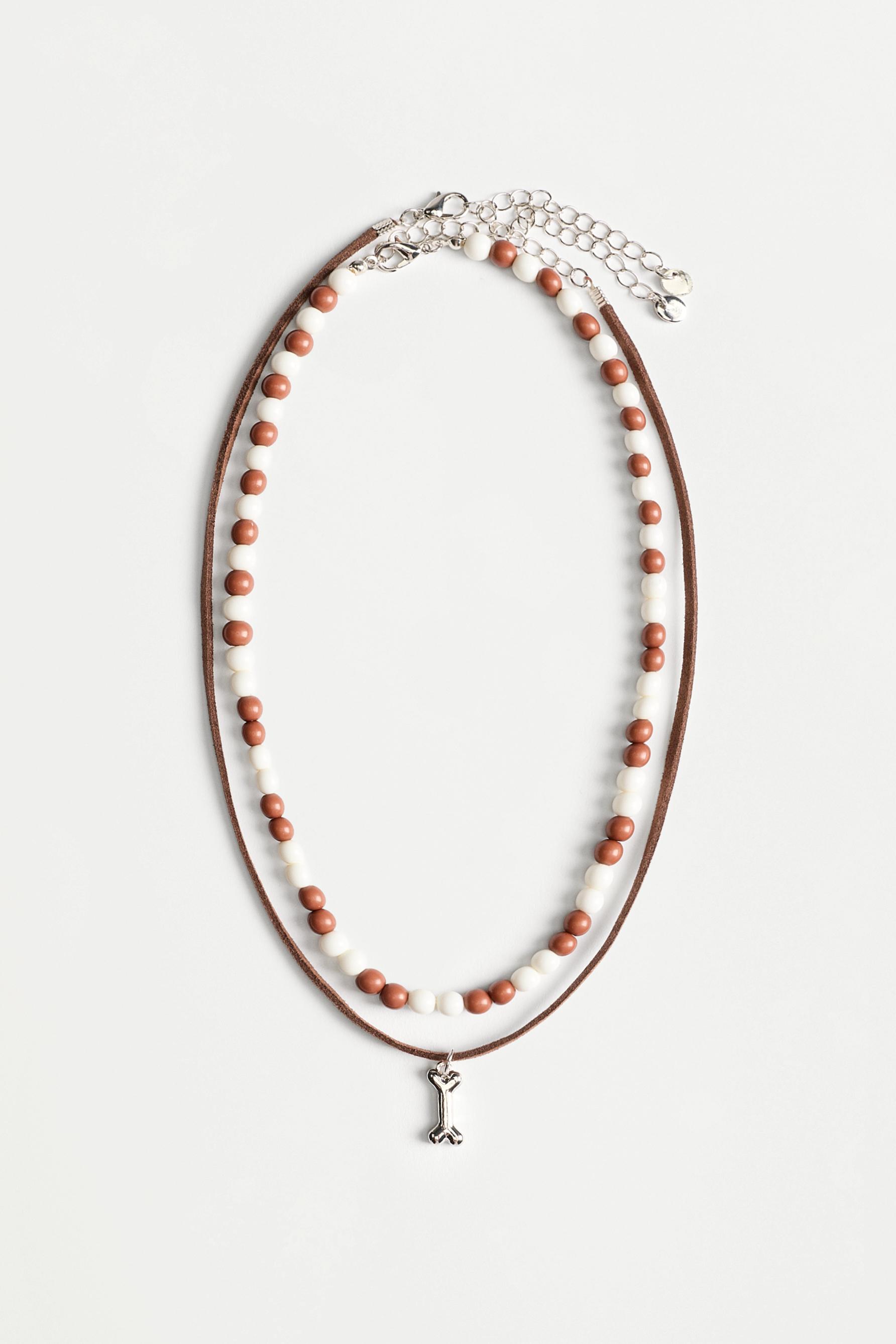 Collar doble hueso