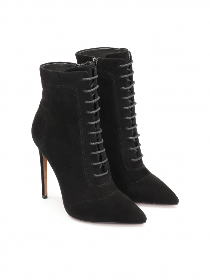 Black ladies' booties with pointed toe caps and high heels