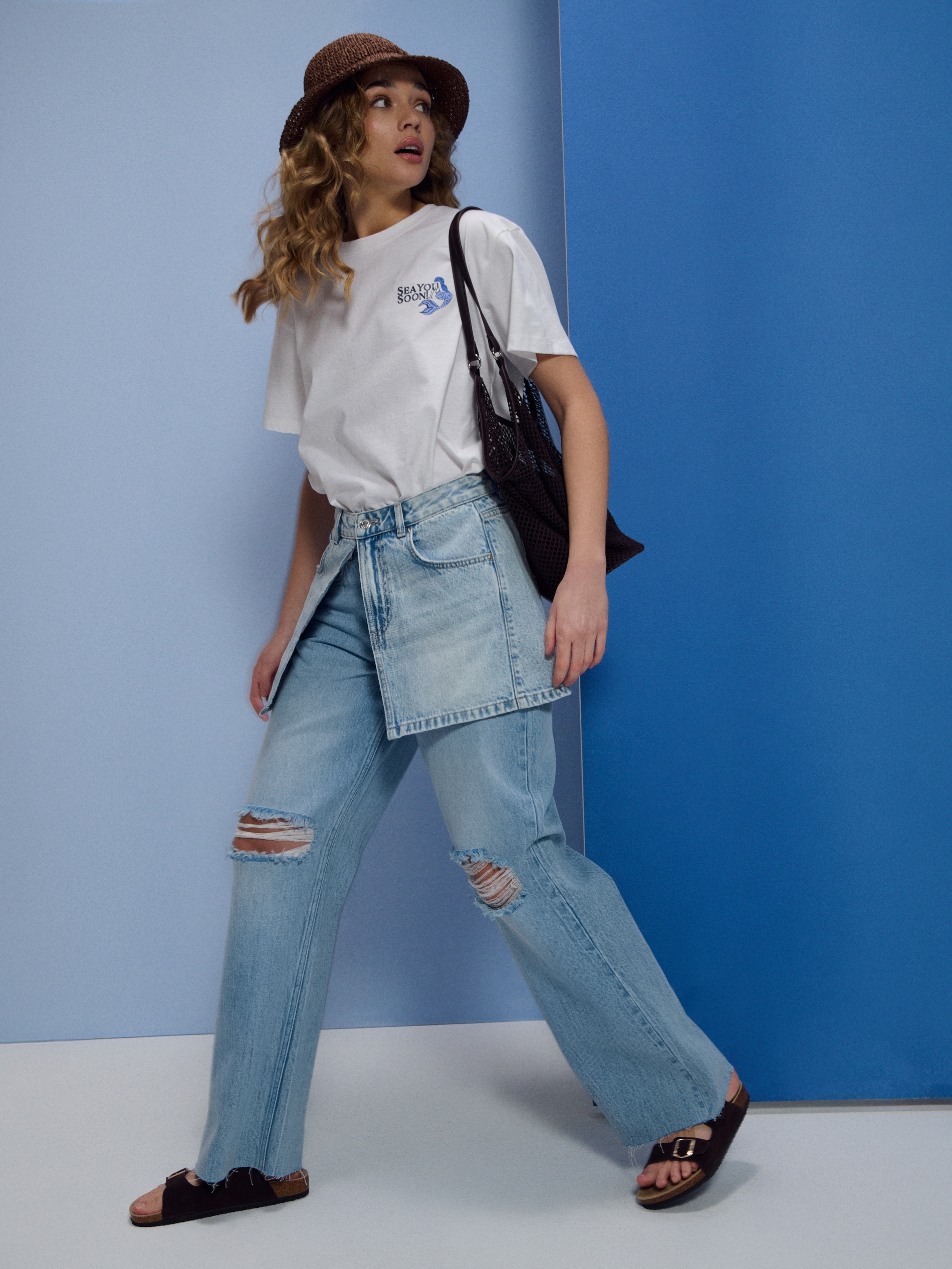 Jeansy baggy low waist z przetarciami