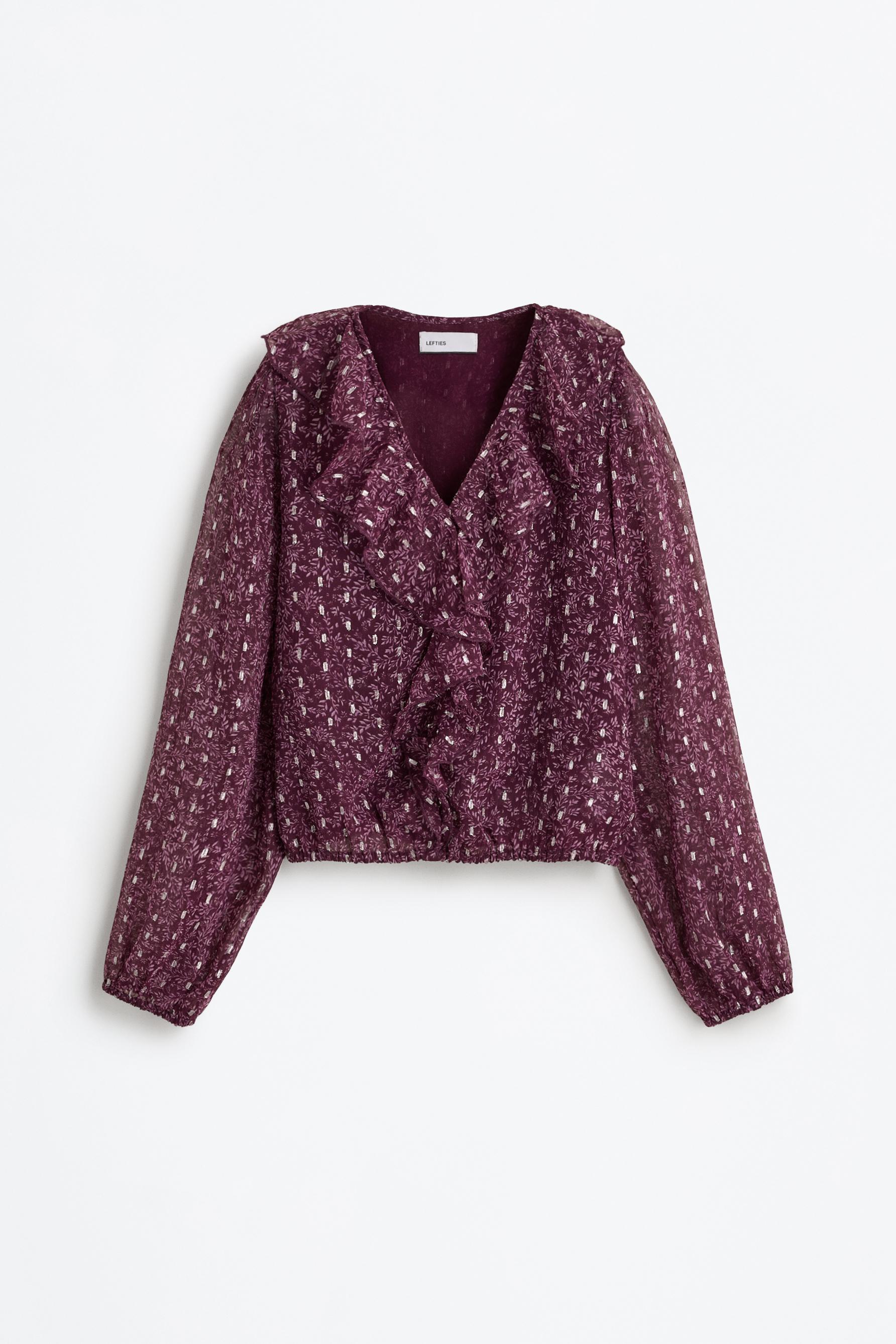 Blusa detalles metalizados